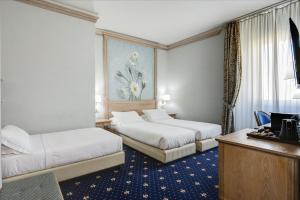 Triple Room room in Hotel De La Ville