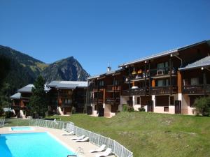 Appartements Charmant appart avec mezzanine, balcon sud, piscine chauffee, proche pistes et centre - FR-1-464-5 : photos des chambres