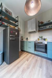 Appartements Le Petit George V - Appartement design proche Thermes : photos des chambres