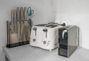 Appartements Le Petit George V - Appartement design proche Thermes : photos des chambres