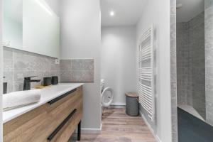 Appartements Le Petit George V - Appartement design proche Thermes : photos des chambres