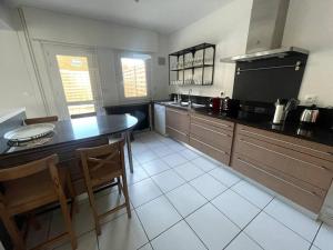 Appartements Belle maison de plage pour familles : photos des chambres
