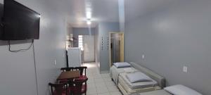 Estúdios Individual na Meia Praia ar, wifi, vaga, cozinha, tv smart - 6 x no cartão sem juros