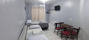 Estúdios Individual na Meia Praia ar, wifi, vaga, cozinha, tv smart - 6 x no cartão sem juros