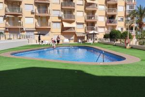 Seafront Apt in Arenales Beach, Pool & Parking