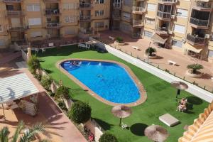 Seafront Apt in Arenales Beach, Pool & Parking