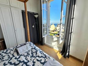 Appartements La Vigie - 30 m de la mer, petite vue mer : photos des chambres