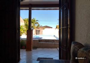 Casa em Itanhaém à 800m da praia - Piscina, WiFi, Churrasqueira e Quintal Grande