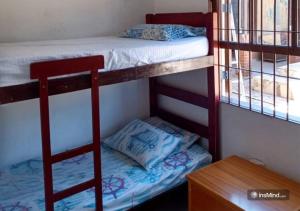 Casa em Itanhaém à 800m da praia - Piscina, WiFi, Churrasqueira e Quintal Grande