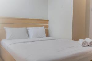 Comfy and Homey Studio Room at Grand Kamala Lagoon Apartment By Travelio