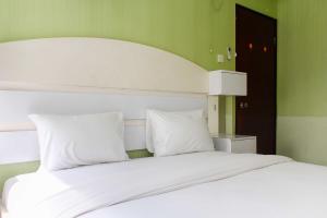 Cozy Stay 2BR Marina Ancol Apartment By Travelio