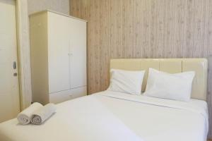 Simply Modern Studio at Pavilion Permata Apartment By Travelio