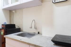 Simply Modern Studio at Pavilion Permata Apartment By Travelio