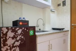 Simply Modern Studio at Pavilion Permata Apartment By Travelio