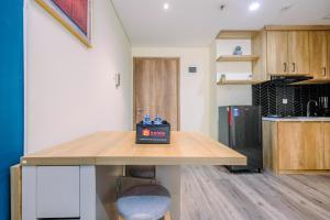 Simply 1BR Apartment at Pejaten Park Residence By Travelio