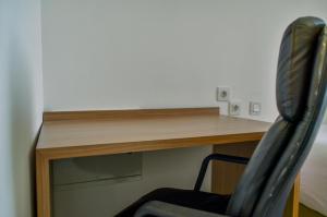 Fully Furnished with Modern Design Studio Sky House BSD Apartment By Travelio