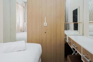 Comfort 2BR at Serpong Greenview Apartment By Travelio