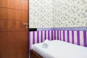 Luxurious and Comfy 2BR at Vida View Makassar Apartment By Travelio