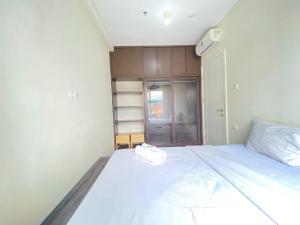 Cozy 2BR Apartment at Parahyangan Residence Bandung near UNPAR By Travelio