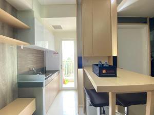 Cozy 2BR Apartment at Parahyangan Residence Bandung near UNPAR By Travelio