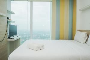 Cozy and Nice Studio Room Tree Park BSD Apartment By Travelio