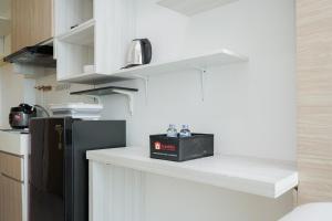 Cozy and Nice Studio Room Tree Park BSD Apartment By Travelio