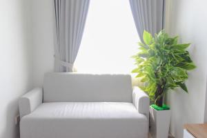 Cozy Living Studio Room at Urbantown Serpong Apartment By Travelio