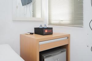 Simply Good Studio No Kitchen Apartment at Aeropolis Residence By Travelio