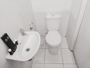 Simply Good Studio No Kitchen Apartment at Aeropolis Residence By Travelio