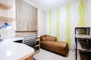 Cozy 1BR Apartment with Workspace at Mustika Golf Residence By Travelio