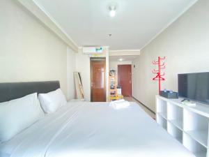 Minimalist Decor Studio Apartment at Gateway Pasteur By Travelio