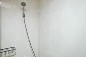 New and Nice Studio at Evenciio Margonda Apartment By Travelio