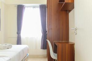 Comfortable and Homey 3BR at Meikarta Apartment By Travelio