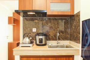 Comfortable and Homey 3BR at Meikarta Apartment By Travelio