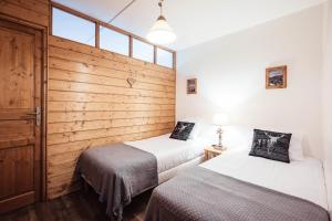 Appartements Apartment - Le Cerf Blanc : photos des chambres