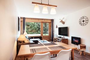 Appartements Apartment - Le Cerf Blanc : photos des chambres