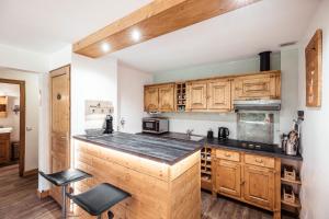 Appartements Apartment - Le Cerf Blanc : photos des chambres