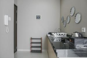 Chic and Cozy Studio Apartment at Ciputra International By Travelio