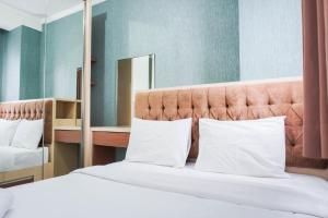 Graceful and Cozy 2BR at Signature Park Grande Apartment By Travelio