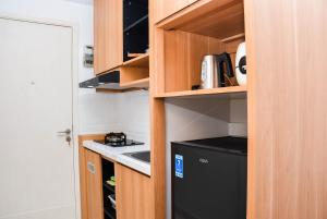 Pleasant Studio Patraland Urbano Apartment near Station By Travelio