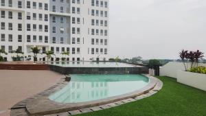 Pleasant Studio Patraland Urbano Apartment near Station By Travelio