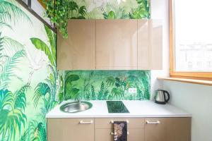 Jungle in Vilnius City Center by URBAN RENT