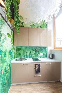 Jungle in Vilnius City Center by URBAN RENT