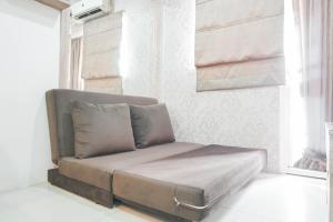 Cozy Stay at 2BR Green Pramuka City Apartment near Shopping Center By Travelio