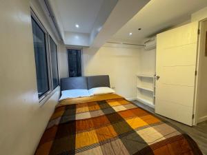 Cozi Modern Loft Suite near high street BGC wifi pool