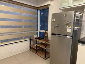 Cozi Modern Loft Suite near high street BGC wifi pool