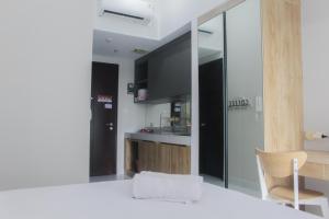 Best Studio Unit with Pool View Casa De Parco Apartment By Travelio