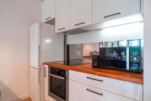 Appartements Escale jardin - Joli apt proche gare avec jardin : photos des chambres