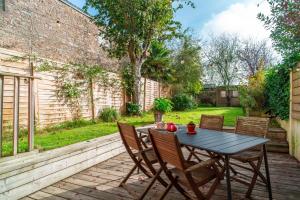 Appartements Escale jardin - Joli apt proche gare avec jardin : photos des chambres