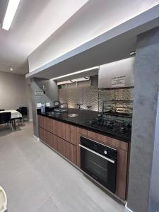 Casa com piscina aquecida, experiência única no litoral norte - Condomínio Morada da Praia!